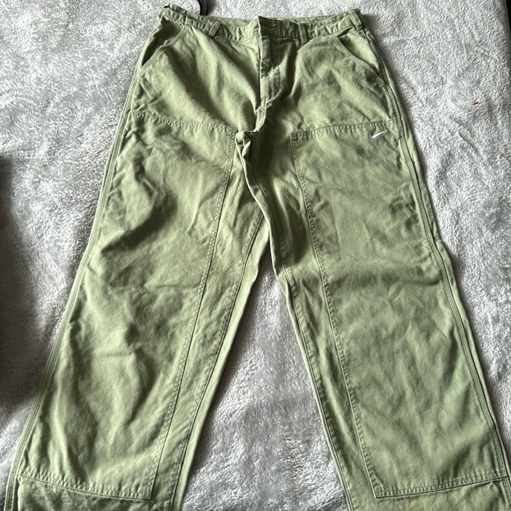Green nike pants
